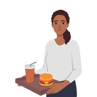 ung stående innehav bricka med burger och citronsaft dryck ohälsosam äter vektor