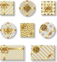 Satz isolierte Weihnachtsgeschenkboxen mit Goldschleife