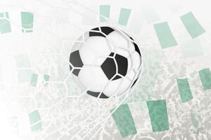 National Fußball Mannschaft von Nigeria erzielte Ziel. Ball im Tor Netz, während Fußball Unterstützer sind winken das Nigeria Flagge im das Hintergrund. vektor