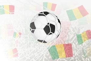 National Fußball Mannschaft von Mali erzielte Ziel. Ball im Tor Netz, während Fußball Unterstützer sind winken das Mali Flagge im das Hintergrund. vektor