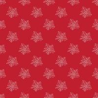 nahtloses Muster mit Schneeflocken auf rotem Hintergrund vektor