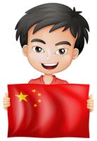 Glücklicher Junge und Flagge von China vektor
