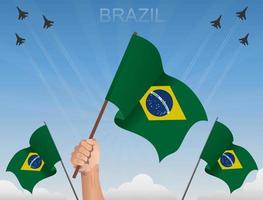 Brasiliens flaggor vajar under den blå himlen vektor