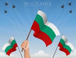 bulgarien flyger under den blå himlen vektor