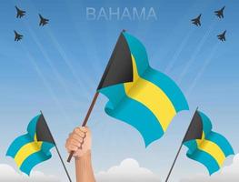 Bahamas-Flaggen wehen unter dem blauen Himmel vektor