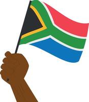 hand innehav och höjning de nationell flagga av söder afrika vektor