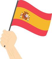 Hand halten und erziehen das National Flagge von Spanien vektor