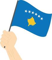 hand innehav och höjning de nationell flagga av kosovo vektor
