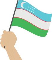 hand innehav och höjning de nationell flagga av uzbekistan vektor