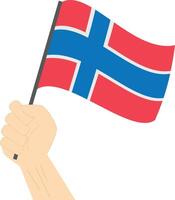 hand innehav och höjning de nationell flagga av Norge vektor