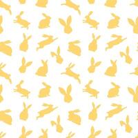 Ostern nahtlos Muster von Gelb Hase Silhouetten im anders Aktionen. festlich Ostern Hasen Design. isoliert auf Weiß Hintergrund. zum Ostern Dekoration, Verpackung Papier, Gruß, Textil, drucken vektor