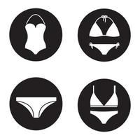 Damenunterwäsche Icons Set. Badeanzüge, BH und Höschen. Vektorgrafiken von weißen Silhouetten in schwarzen Kreisen vektor