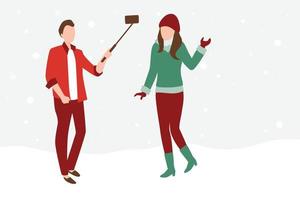 ein Junge und ein Mädchen machen ein Selfie mit einem Selfie-Stick an einem verschneiten Ort. vektor