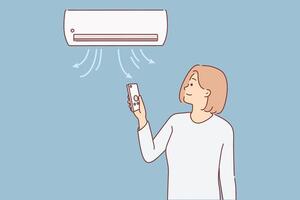 Frau steht unter Luft Conditioner und Verwendet Fernbedienung Steuerung zu Schalter Temperatur Modus vektor