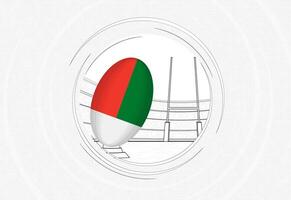 Madagaskar Flagge auf Rugby Ball, gefüttert Kreis Rugby Symbol mit Ball im ein überfüllt Stadion. vektor