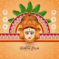 durga puja och Lycklig Navratri festival bakgrund med gudinna ansikte design vektor