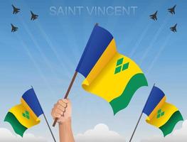 Saint-Vincent-Fahnen wehen unter dem blauen Himmel vektor