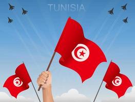 tunesische Flaggen wehen unter blauem Himmel vektor