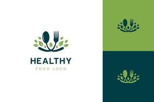 gesund Essen Logo Symbol Design mit ein Gabel Löffel und Blatt Grafik gestalten zum branding organisch Essen Unternehmen oder Gesundheit bewusst Produkte vektor