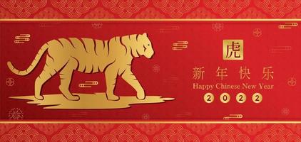 Frohes chinesisches neues jahr 2022, tiger sternzeichen auf rotem farbhintergrund. asiatische Elemente mit Bastel-Tiger-Papierschnitt-Stil. chinesische übersetzung frohes neues jahr 2022, jahr des tigervektors eps10.