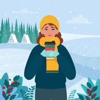 kvinna i varma kläder som håller en kaffekopp i vinterlandskap. vektor illustration i platt stil