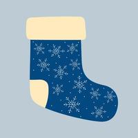 blå julstrumpa dekorerad med snöflingor. jul vinter designelement i doodle stil. vektor