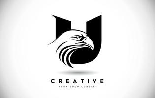 bokstaven u eagle logotyp med kreativa eagle head vektorillustration. vektor