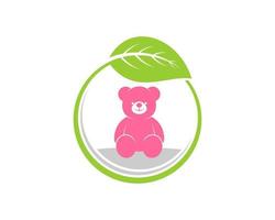 kreisförmiges Naturblatt mit rosa Teddybär im Inneren