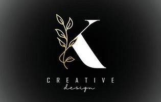 weißes k-Brief-Logo-Design mit goldenen Blättern, Zweigvektorillustration. vektor