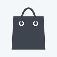 Einkaufstaschensymbol im trendigen Glyphenstil isoliert auf weichem blauem Hintergrund vektor