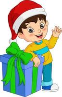 tecknad liten pojke med stor presentförpackning vektor