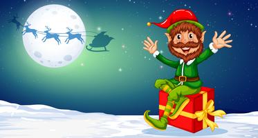 Happy Christmas Elf sitzt auf Geschenk vektor
