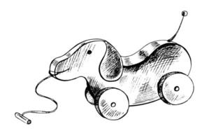 eine handgezeichnete Tintenskizze eines hölzernen Spielzeughundes auf Rädern. Umriss auf weißem Hintergrund, Vintage-Vektorillustration. vintage skizzenelement für etiketten, verpackungen und kartendesign. vektor