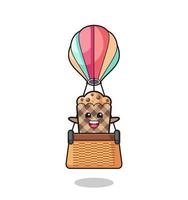 muffinsmaskot som rider på en luftballong vektor