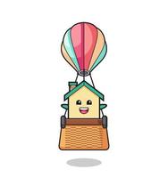 husmaskot som rider på en luftballong vektor