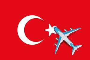 vektorillustration av ett passagerarplan som flyger över Turkiets flagga. begreppet turism och resor vektor