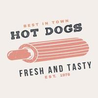 Hot and Fresh Hot Dog Frankreich Retro-Abzeichen-Design. Vektor. Vintage-Design für Cafés, Restaurants, Kneipen oder Fast-Food-Geschäfte. Vorlage für Restaurant-Identitätsobjekte, Verpackungen und Menüs vektor