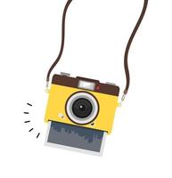 hängande gul kamera med fotokort vektor