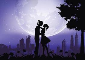 Silhouette eines Paares, das sich unter Mond küsst