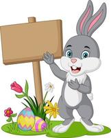tecknad liten kanin med påskägg, blommor och tom planka skylt i gräset vektor