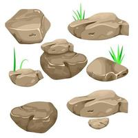vektorillustration av en uppsättning separata tecknade stenblock, stenar och stenar av olika former, med grässtrån, för att fylla de naturliga landskapen och scenerna i spelgränssnittet. vektor