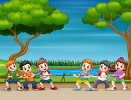 tecknade barn som spelar dragkamp i parken vektor