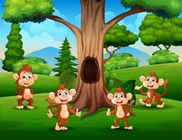 Szene mit Affengruppe unter dem Baum vektor