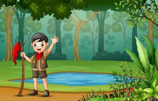 scoutpojke vandrar i skogen vektor