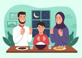 familie, die während des ramadan vor dem iftar-abendessen betet vektor