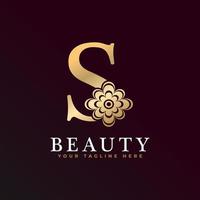 Elegantes Luxus-Logo. goldenes blumenalphabetlogo mit blumenblättern. Perfekt für Mode, Schmuck, Schönheitssalon, Kosmetik, Spa, Boutique, Hochzeit, Briefstempel, Hotel- und Restaurantlogo. vektor