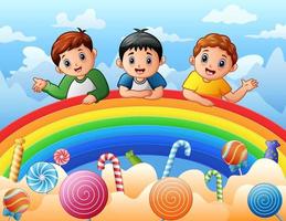 drei jungen auf einer regenbogenillustration vektor