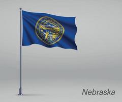 Wehende Flagge von Nebraska - Staat der Vereinigten Staaten am Fahnenmast. te vektor