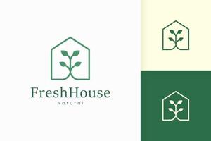 Logo des grünen Hauses der Natur mit Baum- und Blattform vektor