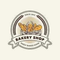 handritad vintage bageri butik logotyp etikett vektor